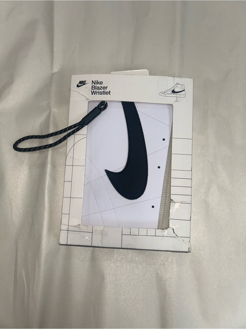 Nike Blazer Wristlet in White with Black Swoosh and Black Strap. NWT